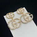 Unisex gold earrings product image 1, provided for visual reference and product detail review