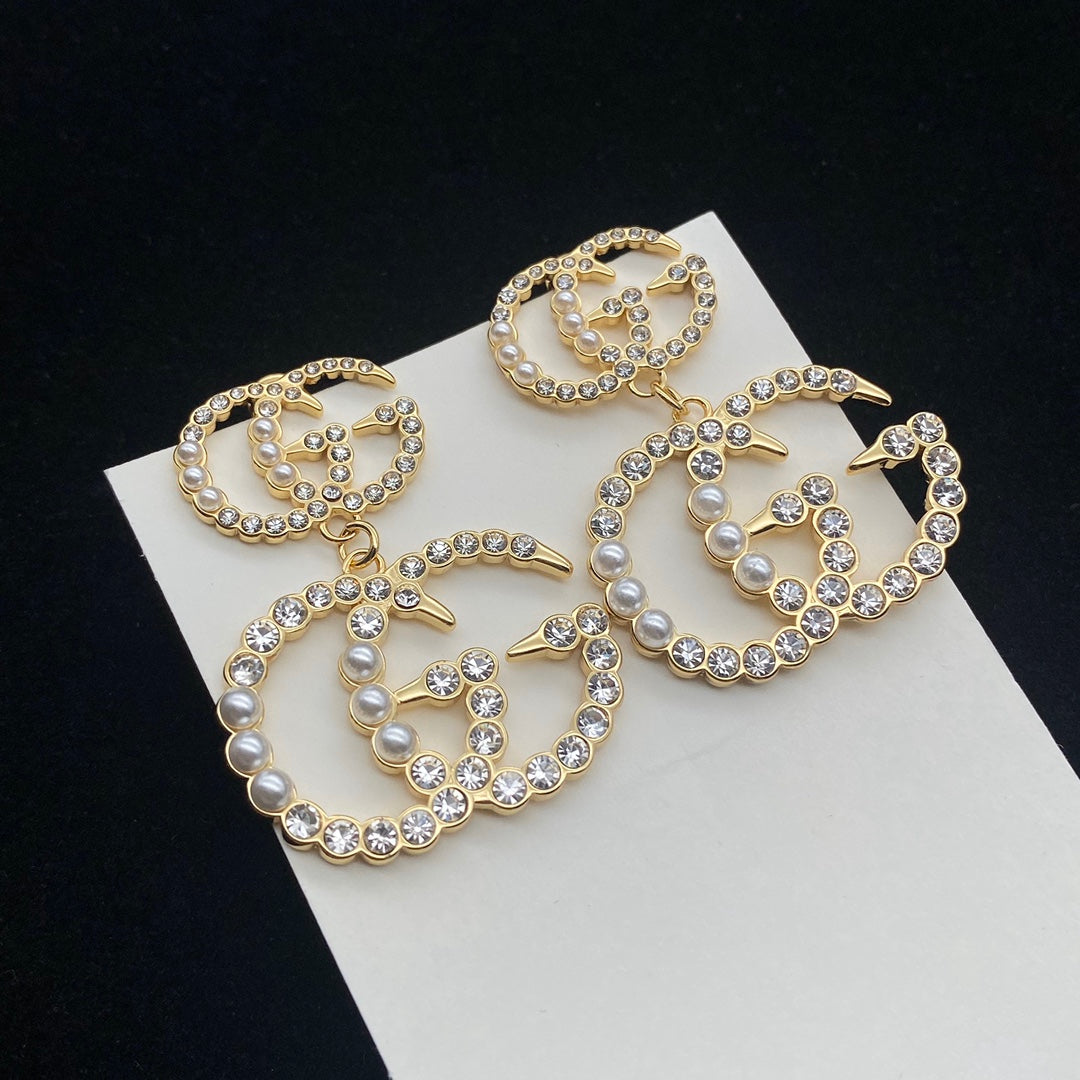 Unisex gold earrings product image 1, provided for visual reference and product detail review