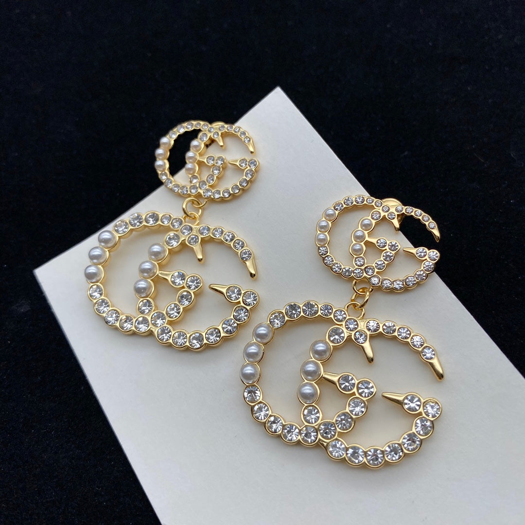 Unisex gold earrings product image 3, provided for visual reference and product detail review