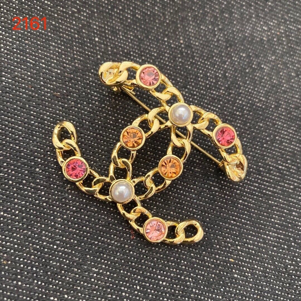 Studded letter tassel brooch product image 17, provided for visual reference and product detail review