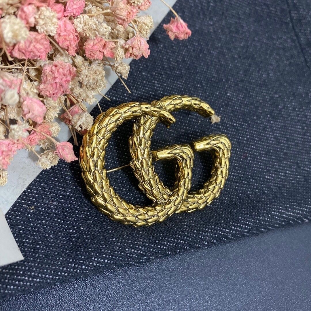 Studded letter tassel brooch product image 10, provided for visual reference and product detail review