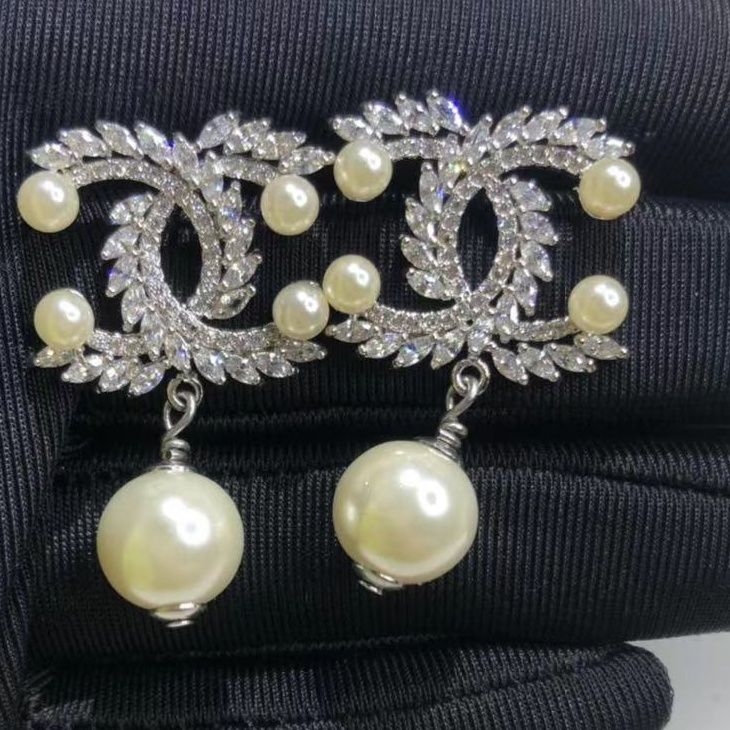 Zircon inlaid pearl steel needle earrings product image 3, provided for visual reference and product detail review