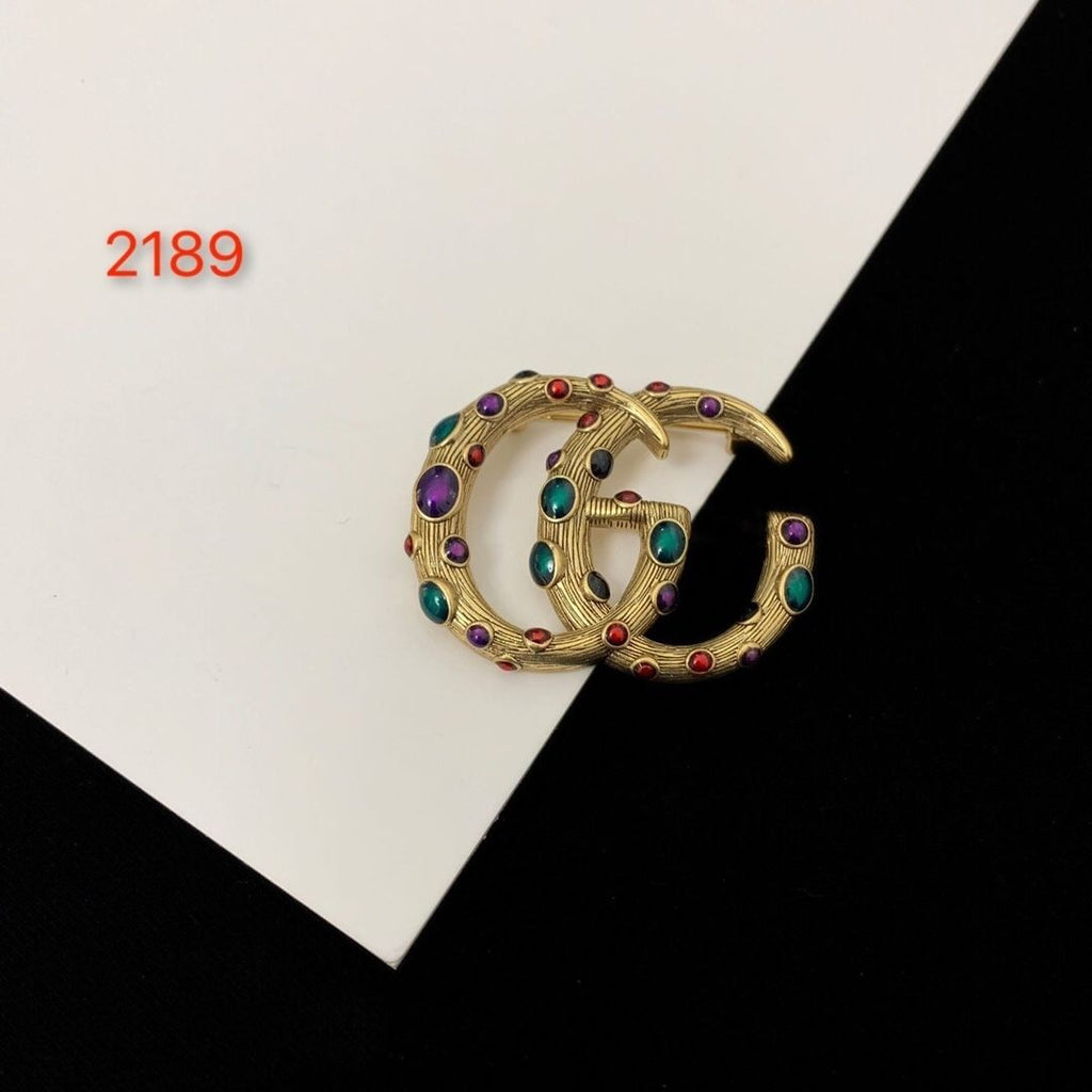 Studded letter tassel brooch product image 14, provided for visual reference and product detail review