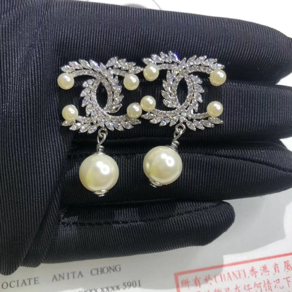 Zircon inlaid pearl steel needle earrings product image 6, provided for visual reference and product detail review