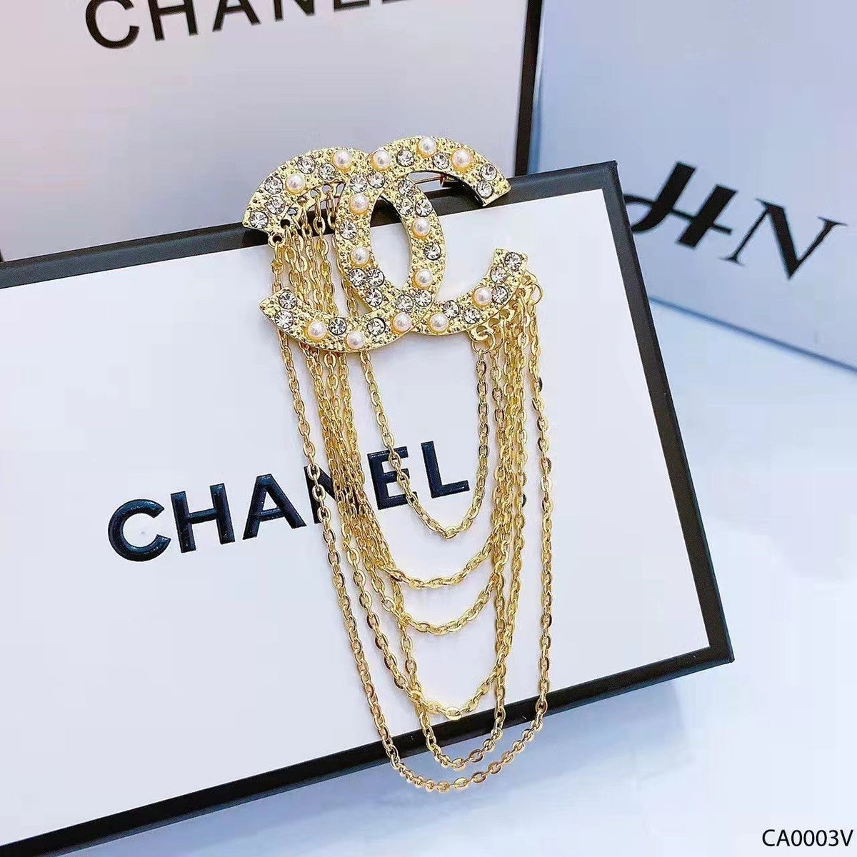 Studded letter tassel brooch product image 6, provided for visual reference and product detail review