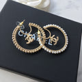 Asymmetric pearl rhinestone earrings product image 1, provided for visual reference and product detail review