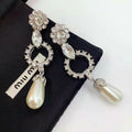 Diamond-set stud earrings product image 1, provided for visual reference and product detail review