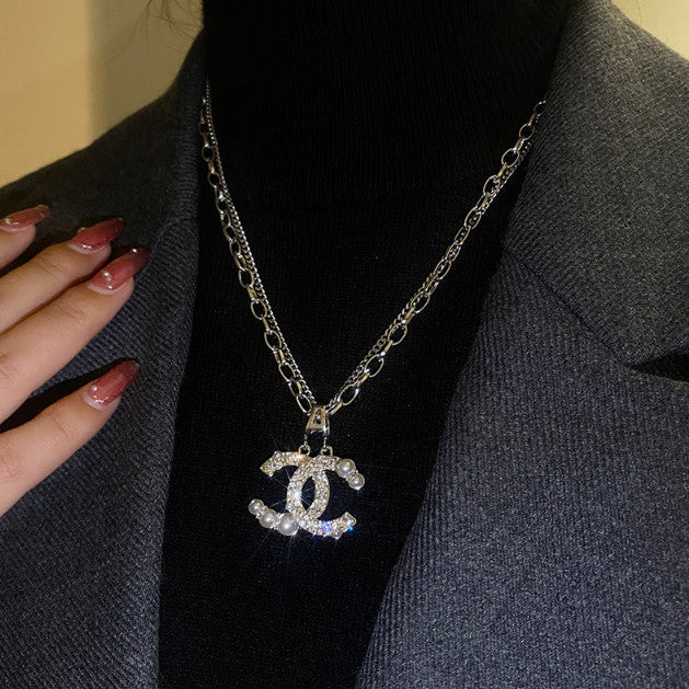 2022 New Fashion Long Imitation Pearl Necklace product image 2, provided for visual reference and product detail review